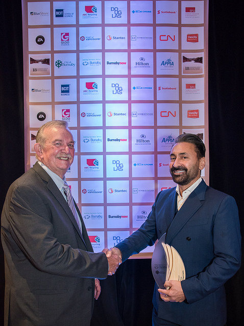 Vern Milani Accepts the award for Milani Plumbing, Drainage & Heating